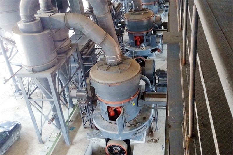 Technician performing mill maintenance